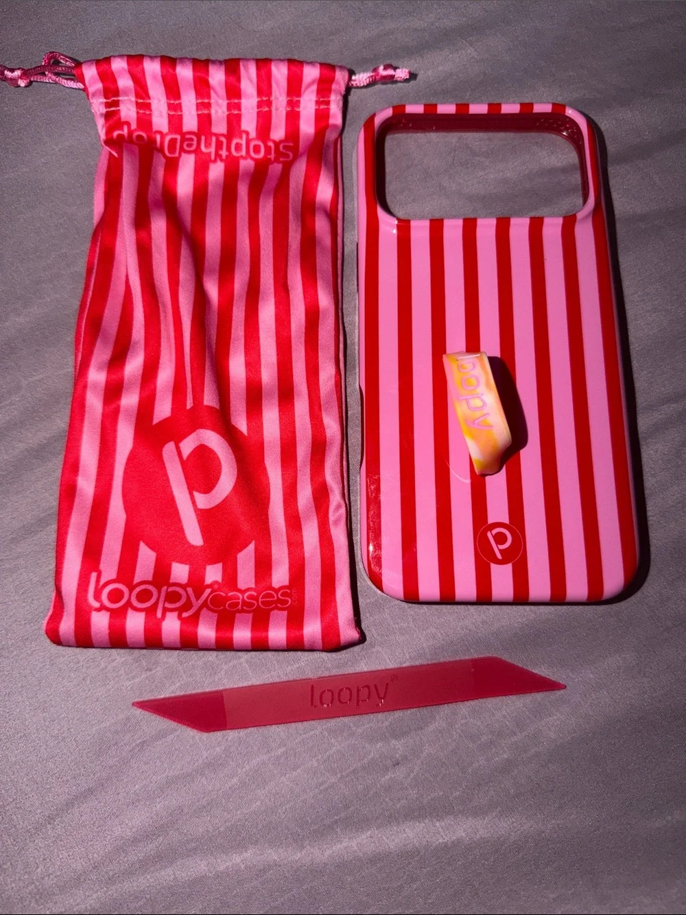 NEW iPhone 17 pro max red and pink striped loopy case with drawstring pouch